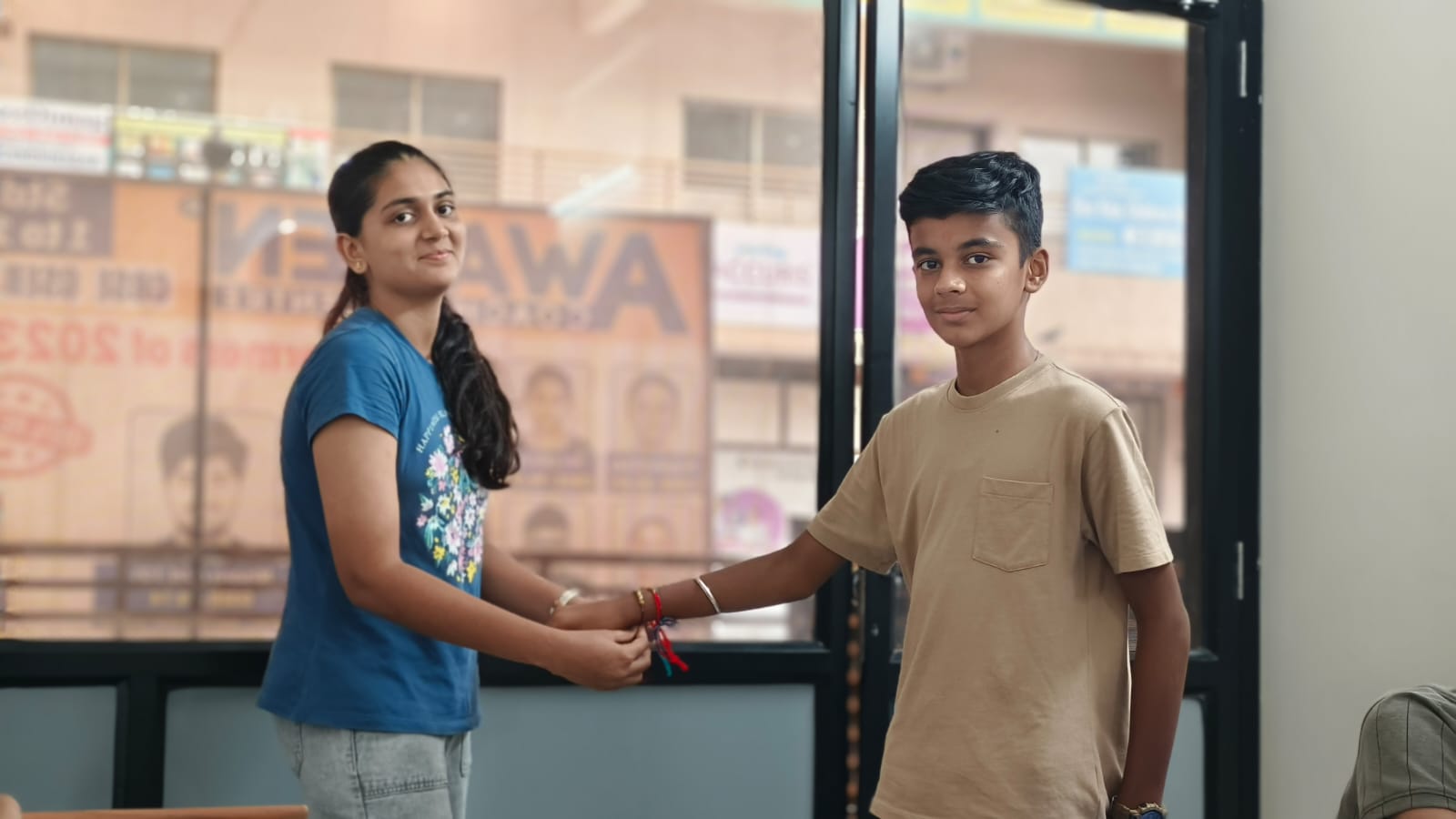 Students celebrating Raksha Bandhan at Awaken Coaching Centre